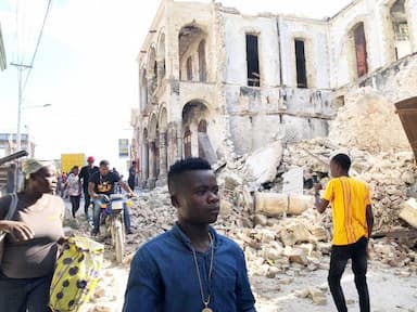 toll-from-earthquake-in-haiti-rises-to-1-297