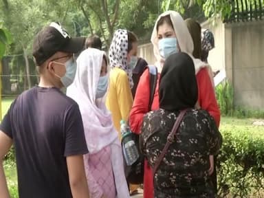 afghan-nationals-gather-outside-aussie-embassy-in-new-delhi-seeking-visas