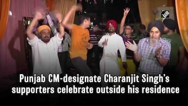 charanjit-singhs-supporters-celebrate-outside-his-residence