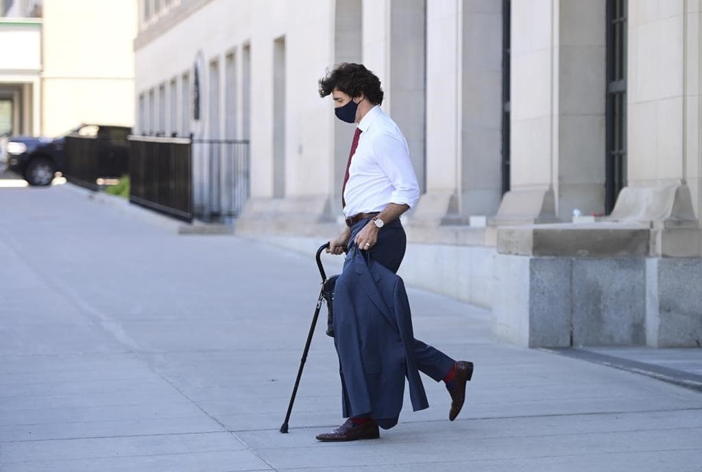 pm-trudeau-walking-with-cane-after-he-sprained-his-ankle-playing-frisbee