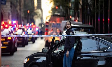 Gunman kills 4, including police officer, in shooting at New York City office tower