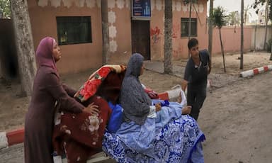 israeli-airstrikes-in-gaza-kill-48-people-including-22-children-hospitals-say