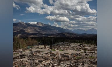 downpour-in-jasper-national-park-slows-fires-but-comes-with-warning