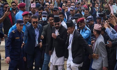 nepals-youngest-prime-minister-sworn-in-after-landslide-election-win