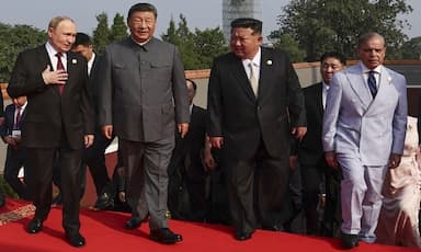 putin-meets-north-koreas-kim-in-beijing