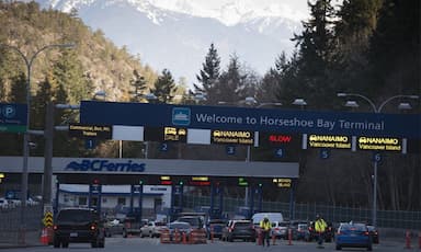 Boy aged 4 dead, mother critical, after being pinned under bus at B.C. ferry terminal