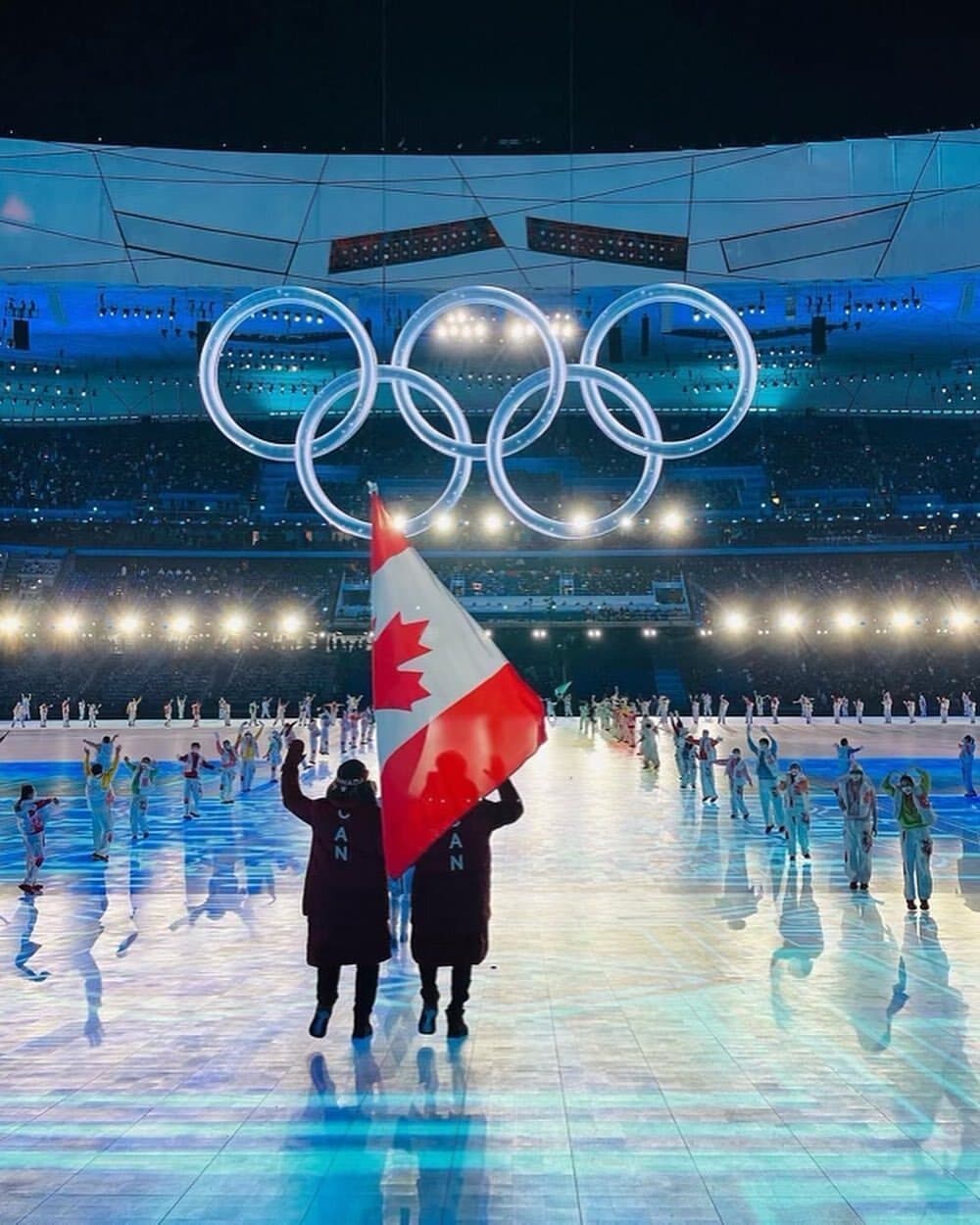 canadian-flag-bearers-waved-the-maple-leaf-at-the-opening-ceremony-of-the-winter-olympics