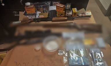prince-george-police-seize-suspected-cocaine-weapons-and-cash-during-business-search