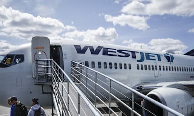westjet-flight-attendants-vote-99-4-in-favour-of-strike-as-august-long-weekend-travel-faces-disruption